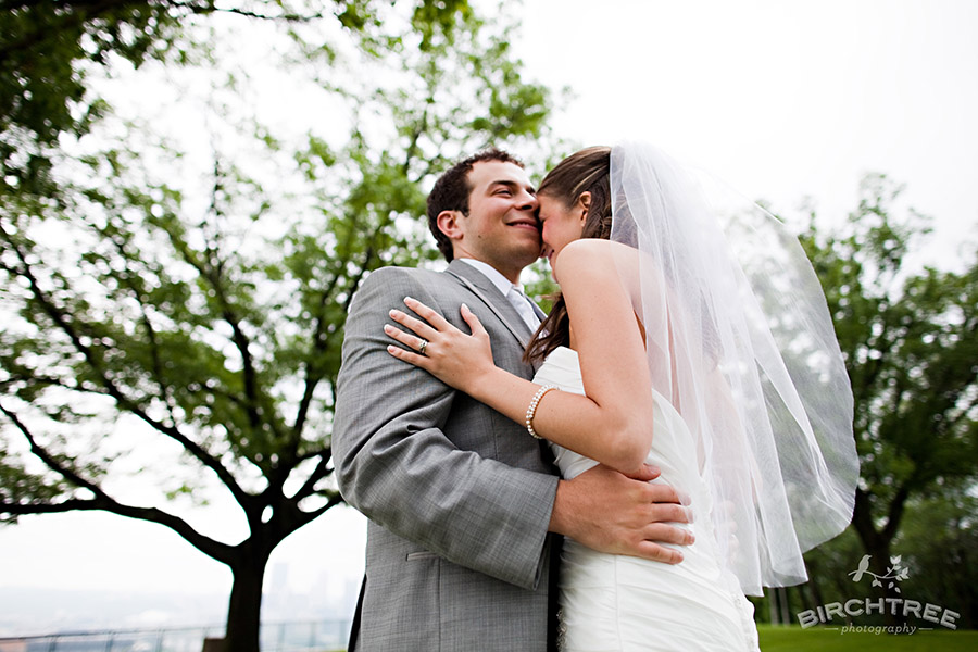 photo of couple on Mt. washington at the west end overlook in pittsburgh on their wedding day