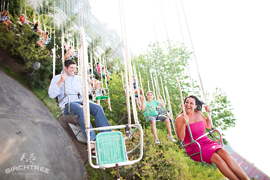 engagement pictures on a swing
